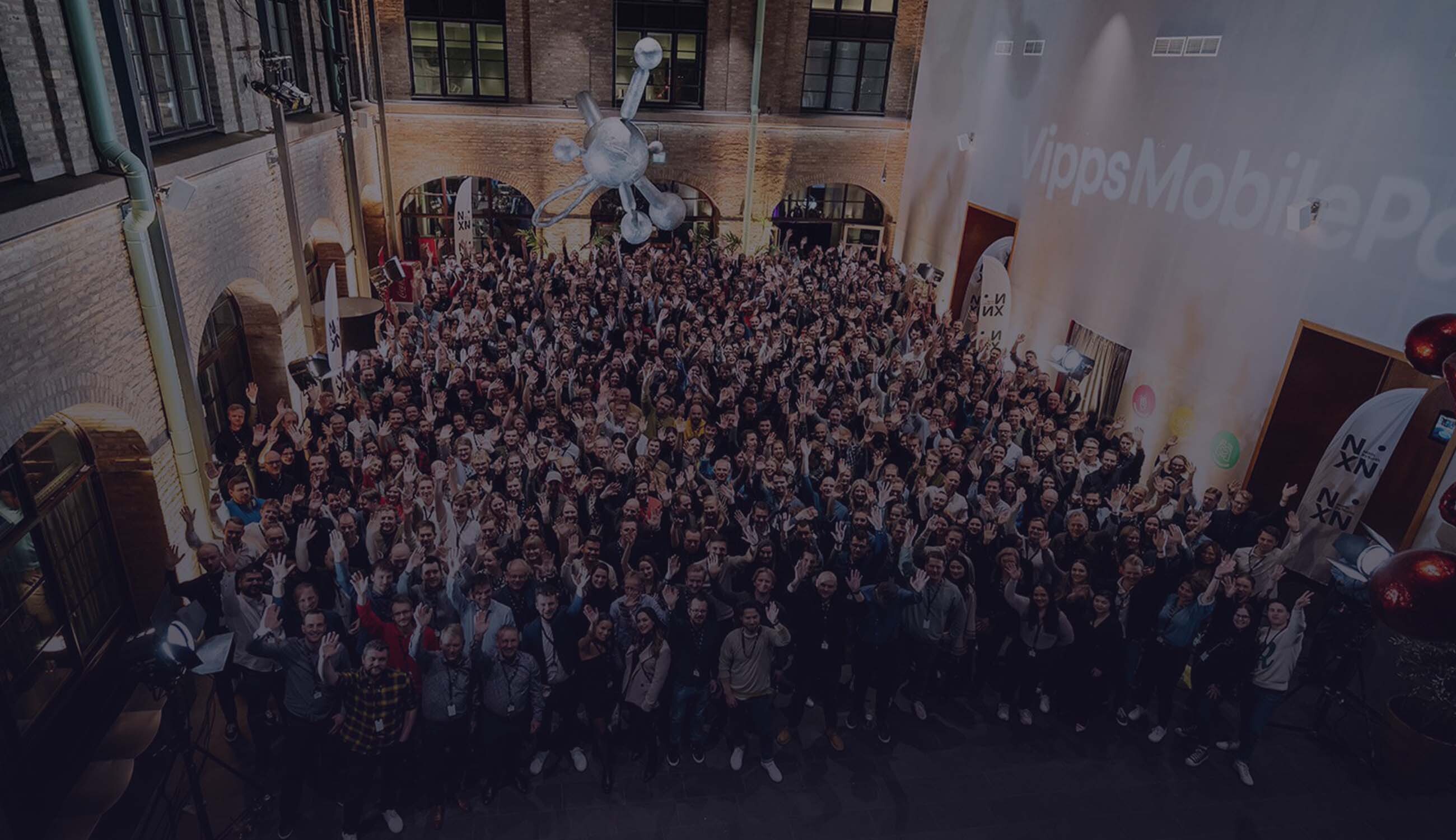 Vipps MobilePay people with dark layer.